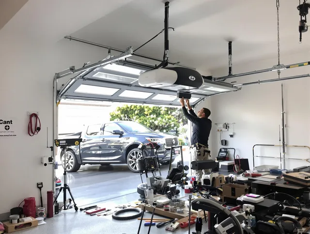 Brook Park Garage Door Repair specialist installing smart garage door opener system in Brook Park home