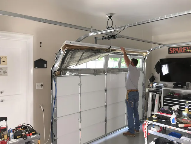 Garage door section replacement by Brook Park Garage Door Repair in Brook Park