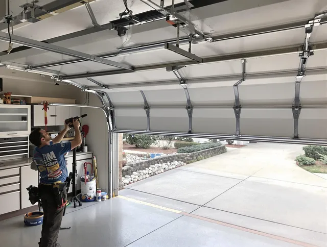 Garage door track repair service by Brook Park Garage Door Repair in Brook Park